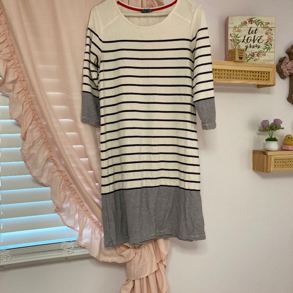 Causal stripped dress . Few small marks that may come up out in wash .